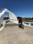Clive on his power assisted cycle in New Plymouth. Note volcano in the background of this lovely bridge...Te Rewa Rewa bridge.